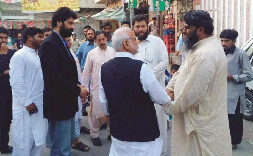 لاہور: تحریک انصاب کے سیاسی مشیر اعجاز احمد چوہدری ، امیدوار ..