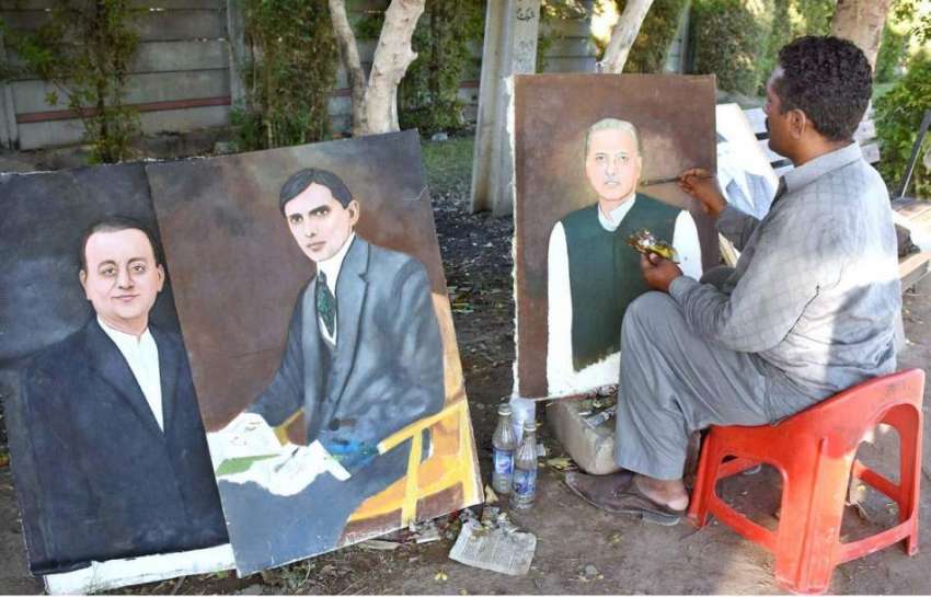 لاہور: ایک آرٹسٹ روڈ کنارے بیٹھا صدر مملکت ممنون حسین کی ..