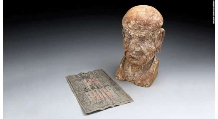 قدیم چینی مجسمے سے 700سال پرانا کرنسی نوٹ برآمد