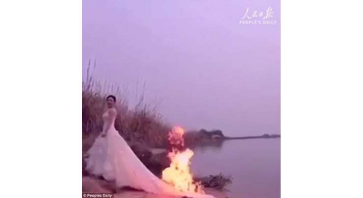 شادی کی بہترین تصویر لینے کے لیے چینی دلہن  نے   اپنےکپڑوں کو آگ لگا لی