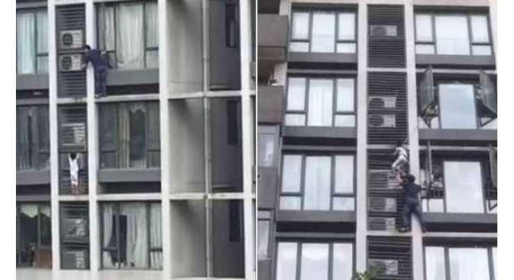 چین کا ”سپر ڈیڈ“ اپنے سات سالہ بیٹے کو بچانے کے لیے ساتویں منزل پر چڑھ گیا