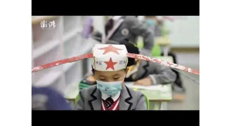 چینی طلباء سماجی فاصلہ برقرار رکھنے والی انوکھی  ٹوپیاں   پہن کر  سکولوں میں واپس آنے لگے
