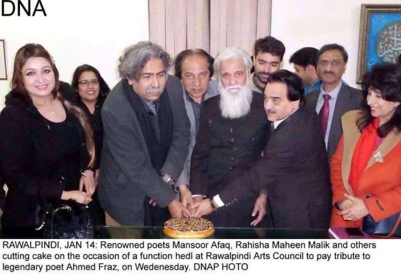 Mansoor Afaq, Ehsan Akbar, Hassan Abbas Raza And Others Cutting Birthday Cake Of Ahmad Faraz